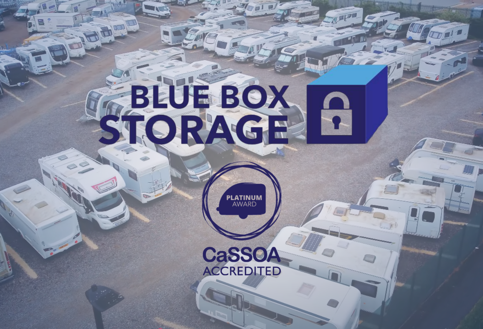 Drive-up steel storage containers on a secure, well-lit storage yard in Doncaster with a car parked beside one container